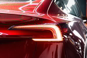 Red Tesla Model 3 Highland Back lights